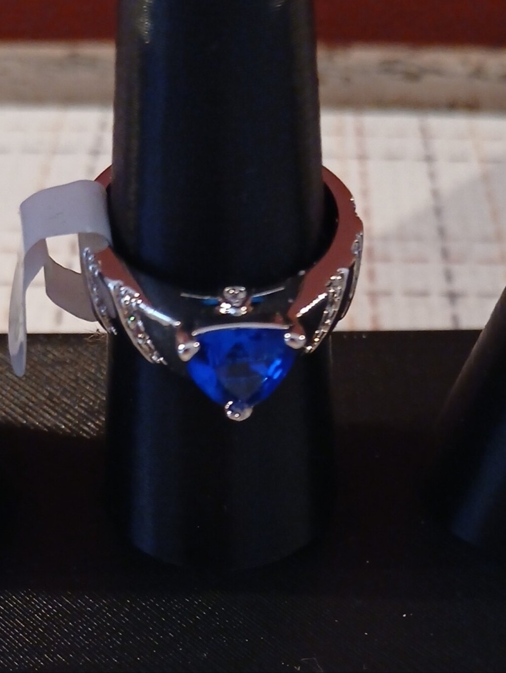 BOMB PARTY trillion-cut blue gemstone ring